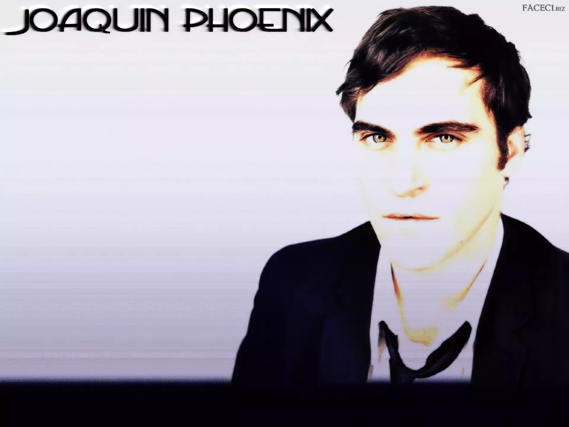 Joaquin Phoenix, czarna marynarka